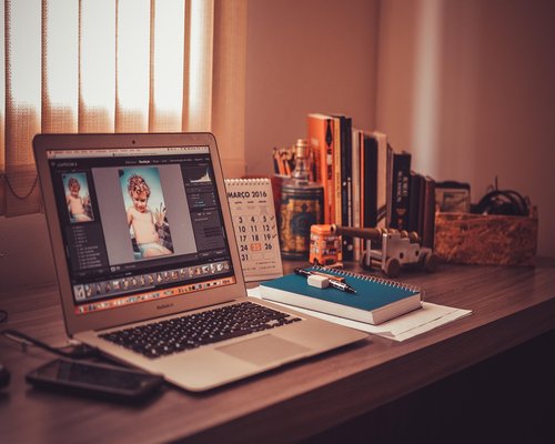 A person taking a visual break from their laptop screen at home